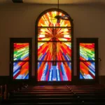 antique stained glass church window, colorful, restored, no people